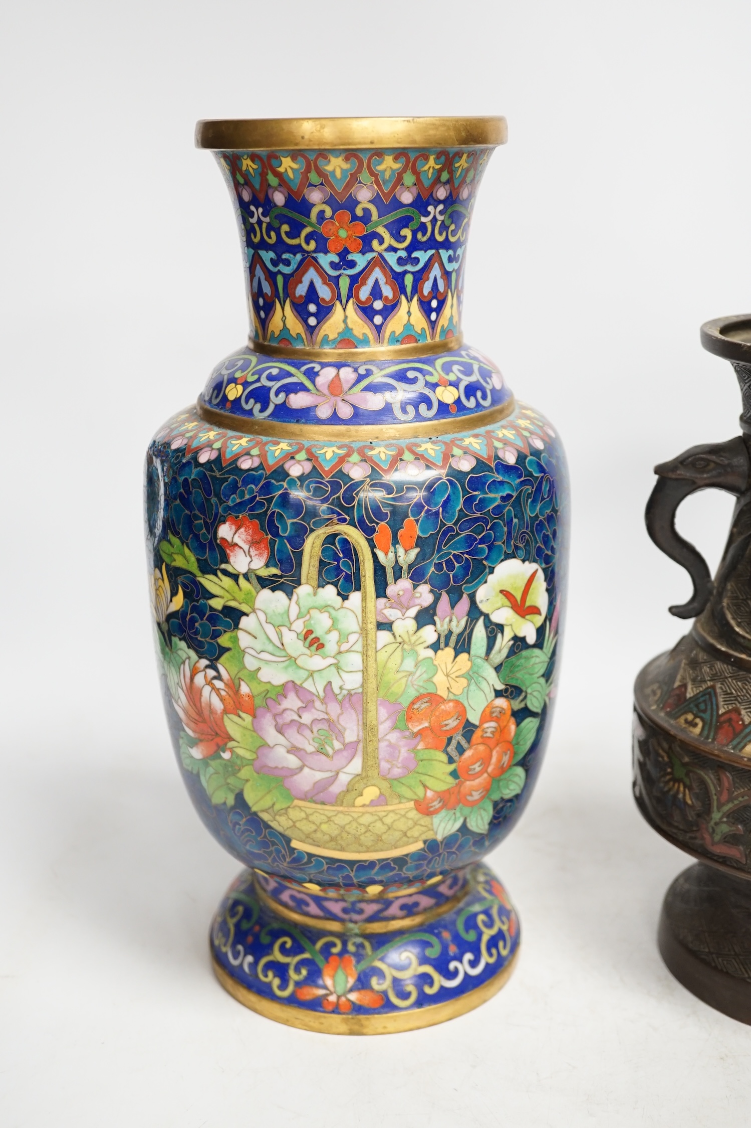 A Japanese bronze and champlevé enamel vase and a Chinese cloisonné enamel vase, Champlevé vase 24cm high. Condition - cloisonné vase dented, champlevé vase in good condition